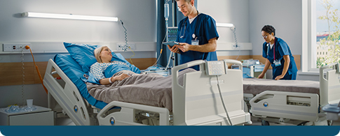 nurse by a medical bed in a hospital